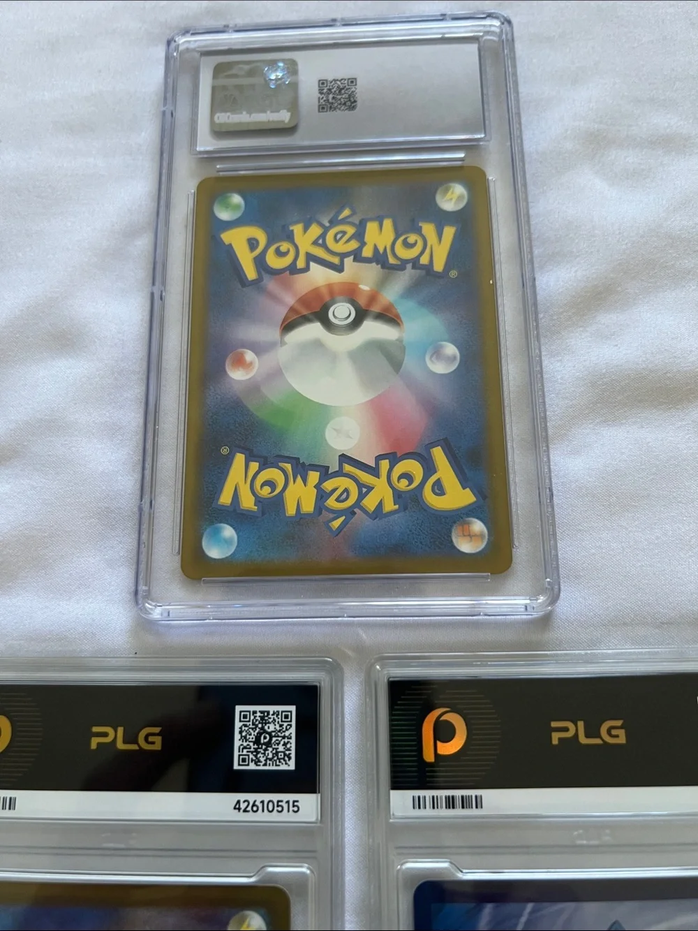 Pokemon Graded Trading Cards — Gold, Black and Purple Accents